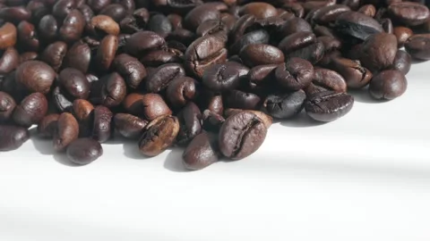 Panning on dark roasted coffee beans 4K footage Stock Footage 91382987