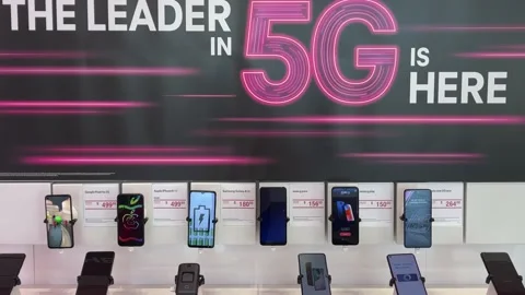 Panning up on a display of Google, Apple, Samsung, Moto, OnePlus, Alcatel, an Stock Footage 163992312