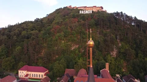 Panning from down to up of beautiful Rasnov Citadel in Romania Stock Footage 246010551