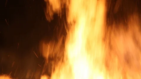 Panning down from the embers into the fire Stock Footage 122355352