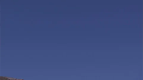 Panning down face of Vesuvius, ending in crater at bottom of mountain. Stock Footage 86754100