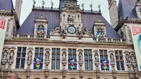 Panning down motion of the frontal side of the Hotel de Ville city hall with Stock Footage 325716612