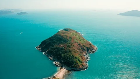 Panning Down Over an Island in Hong Kong with a Drone Stock Footage 122254502