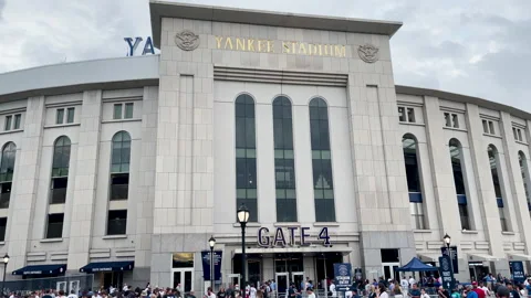 Panning down shot of front of Yankee Stadium Stock Footage 163856542