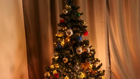 Panning down from the top of the Christmas tree Stock Footage 82972556