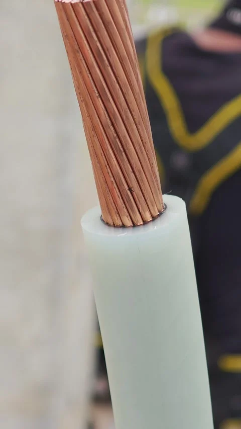 Panning down video of a stripped thick copper underground cable. Stock-Footage 339049381