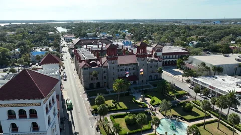 Panning drone clip showcasing the Lightner Museum in downtown St. Augustine Stock Footage 327493041
