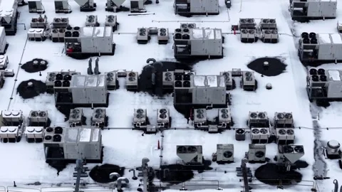 Panning drone fly of heating, ventilation, and air conditioning system in Stock Footage 328703029