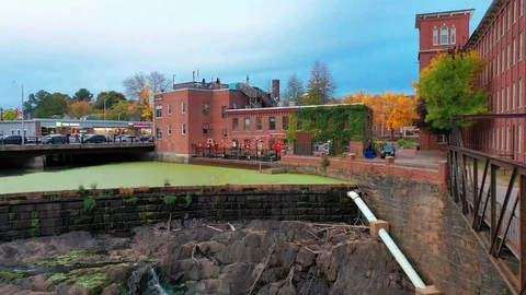 Panning Drone Shot Over Old Dam In Downtown Dover New Hampshire Video stock 128193359
