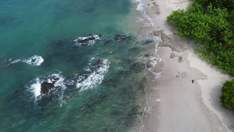 Panning drone shot over the Pacific coast of Costa Rica Video stock 318534220
