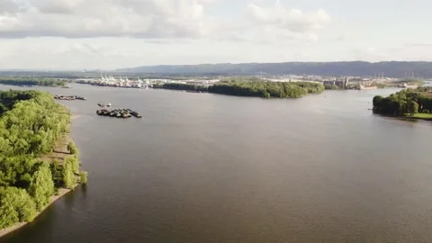 Panning drone shot overlooking a river Stock Footage 194446597