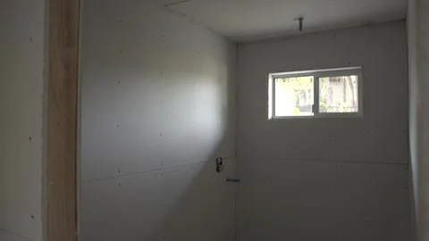 Panning drywall room Stock Footage 301104544