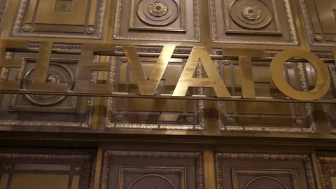 Panning elevator sign close up Stock Footage 153645127