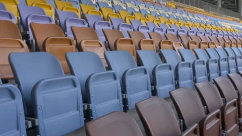 Panning of empty stadium seats, stadium without spectators. Video stock 129733591