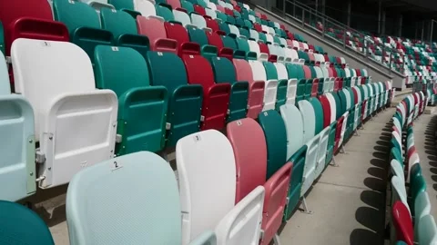 Panning of empty stadium seats, stadium without viewers. Stock Footage 130976372