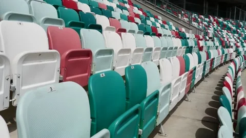 Panning of empty stadium seats, stadium without viewers. Stock-Footage 130976399