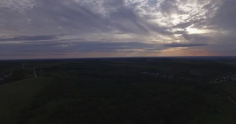 Panning fly horizon over fields evening 스톡 동영상 108744434