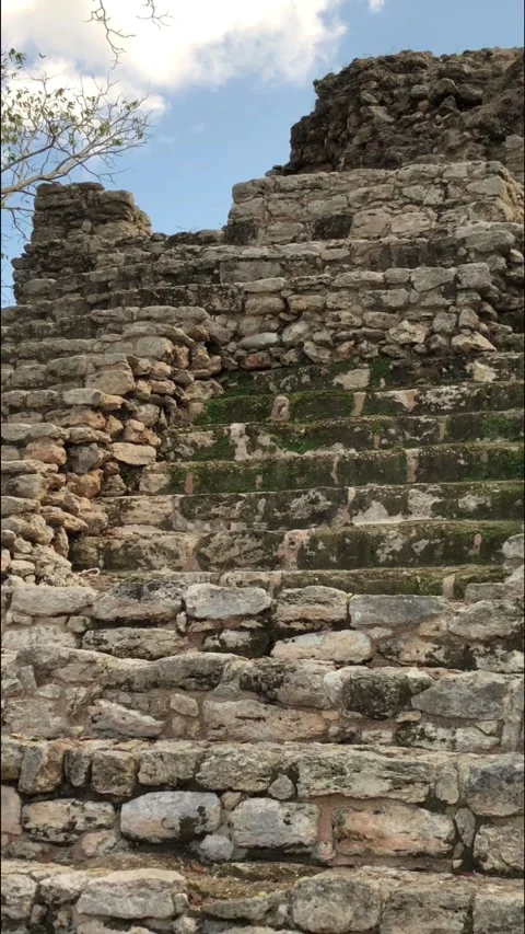 Panning hand-held shot of the ruins of a Mayan temple in Costa Maya, Mexico Stock Footage 223389603