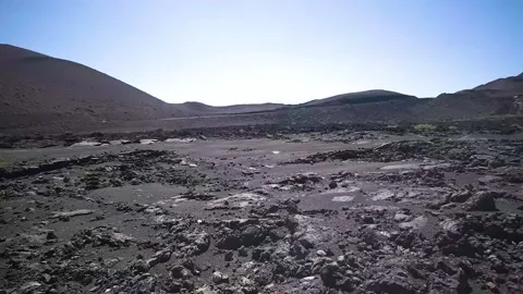 Panning HD shot of Volcanic Soil. Lanzarote, Timanfaya National Park Stock Footage 168346474