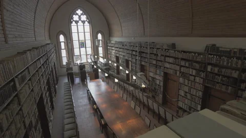 Panning High Above The Library Of An Old German Monastery, With Books Lining The Stock Footage 154580962