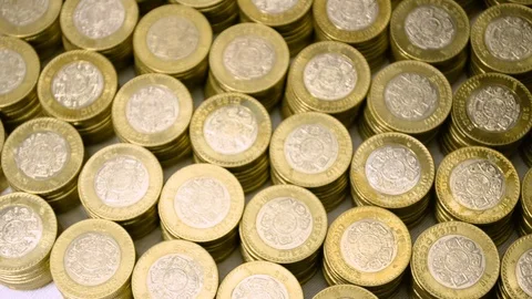 Panning horizontal a piles of money Stock Footage 126565878