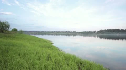 Panning of lake boat on shore Stock Footage