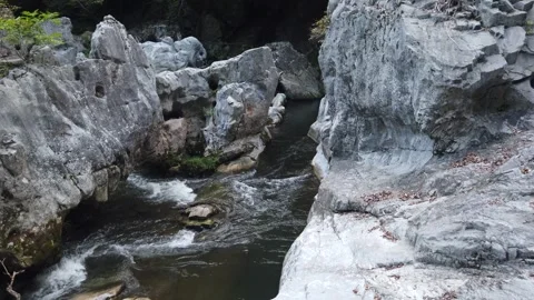 Panning Landscape of Stone River, Stream Flow in Scenic Clear Geological Stock Footage 344472808