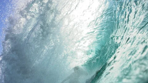 Panning A Large Passing Wave With A Surfer From Beneath The Water Surface (Shot Stock Footage 250315731