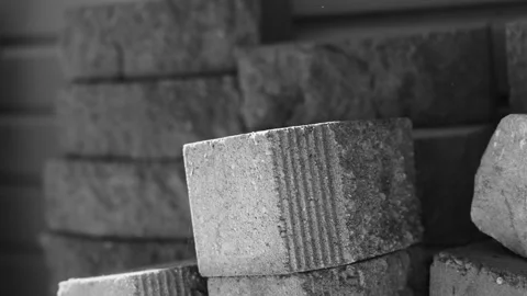 Panning left across yard work bricks before a project. Stock Footage 340922673