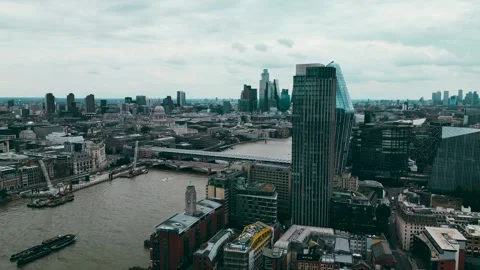 Panning left the Millennium Bridge over the River Thames London UK Video stock 290241410