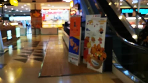Panning from left to right, blur and bokeh. Department stores in Bangkok. Stock Footage 157623555