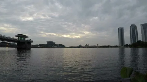 Panning left to right time lapse during cloudy day at lake near Putrajaya city. Stock Footage 85639668