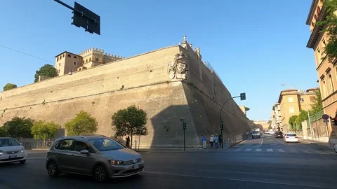 Panning left to see the walls of Vatican City in Rome, Italy Stock Footage 247138043