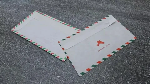 Panning letter envelopes on table Stock Footage 273110941