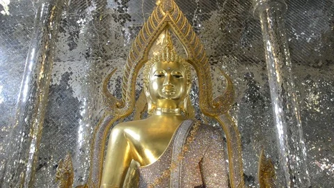 Panning medium shot image Buddha in glass temple. Stock Footage 79745212