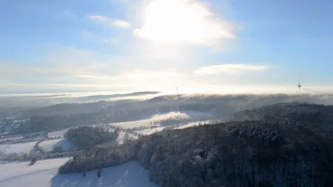 Panning motion over snow covered winter wonderland in German Eifel close to A Stock Footage 102514972
