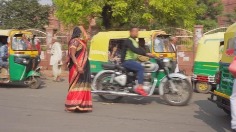 Panning motion of parked auto rickshaws in Agra, India Stock Footage 101414075