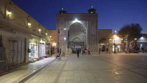 Panning motion of square outside the Vakil Mosque, Shiraz, Iran Stock Footage 100738536
