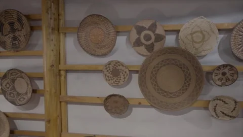 Panning native american weaved basket relics Stock Footage 345762614