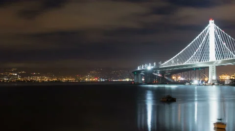 Panning night time lapse of the new section of the San Francisco bay bridge Video stock 43368134