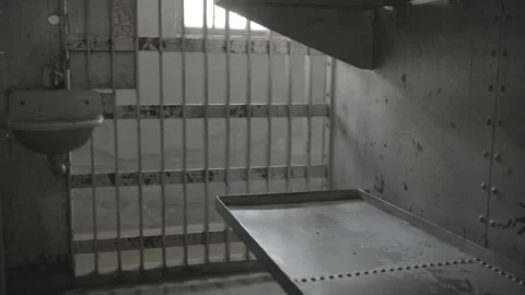 Panning of old steel prison cell Stock Footage 345762463