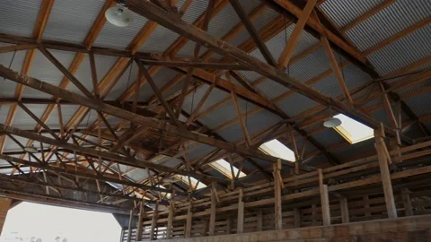 Panning open frame barn exposed beams Stock Footage 142985150