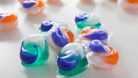 Panning Over Brightly Colored Tide Detergent Pods in 4K Stock Footage 85993139