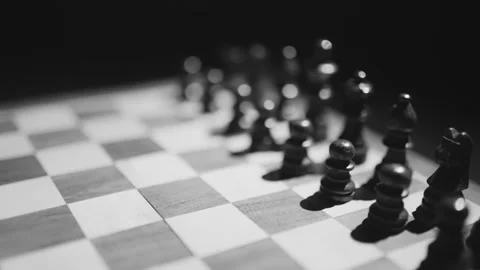 Panning over a chess board before the start of a game. 스톡 동영상 262007967