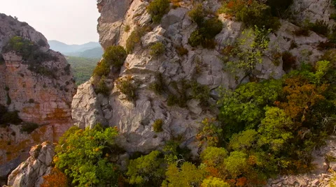 Panning Over a Cliff Face in a Gorge Stock Footage 66924684