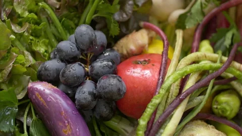 Panning Over Colorful Fresh Fruits And Vegetables Stock Footage