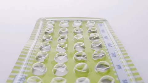Panning Over an Empty Package of Birth Control Pills Stock Footage 112540971