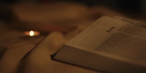 Panning over open bible Stock Footage 126077907