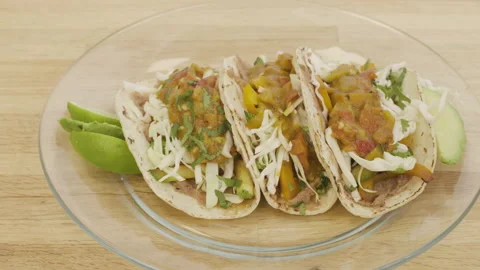 Panning Over a Plate of Tacos Stock Footage 141027101