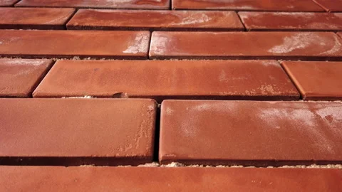Panning over red brick wall with obvious moisture Stock Footage 154869691